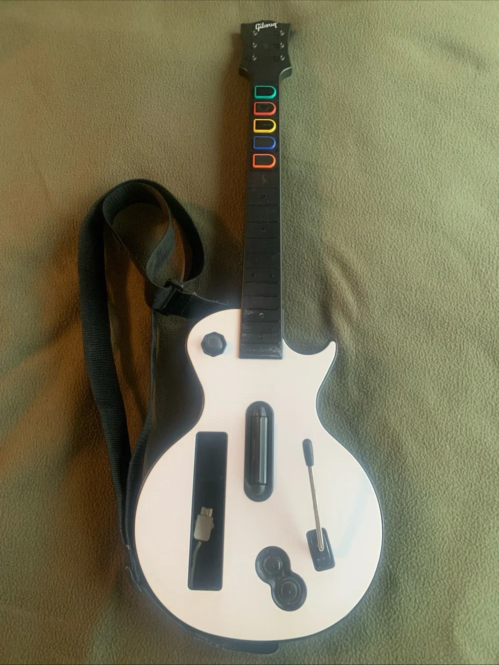 Les Paul Controller for Nintendo Wii. Black and white. 29” x 10” x 4”.